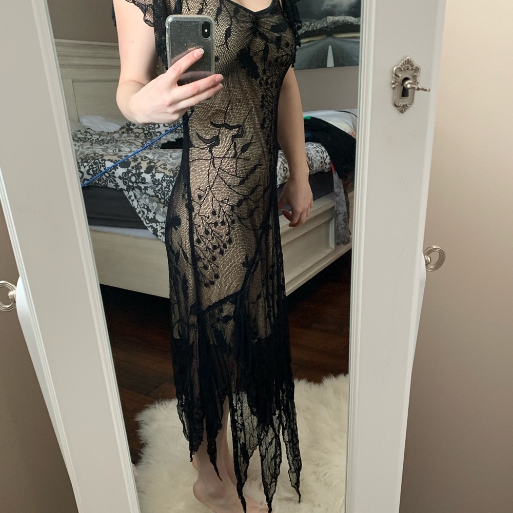 Elegant black lace dress. Suitable for many formal events.